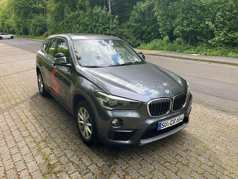 Grau Gebraucht 2017 BMW X1 Advantage SUV | 9.999 € (Fairer Preis) - Bild 1/4