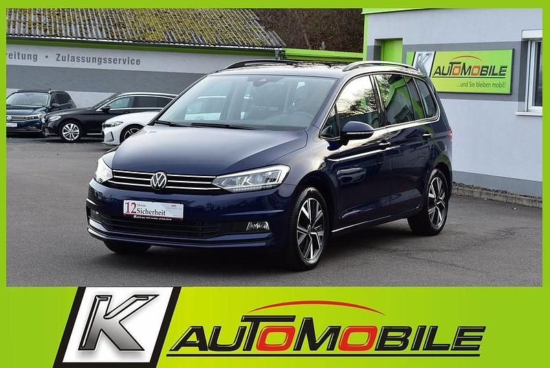 Atlantik blue metallic Gebraucht 2023 VW Touran Comfortline Van / Kleinbus | 29.940 € (Fairer Preis) - Bild 1/4