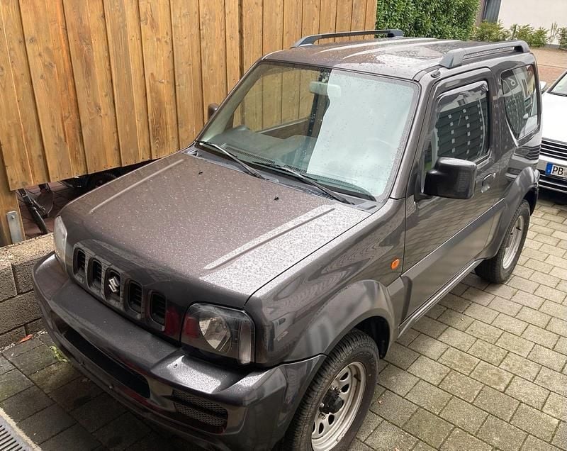 Grau Gebraucht 2012 Suzuki Jimny SUV | 8.000 € (Guter Preis) - Bild 1/2