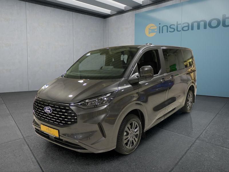 Grau Gebraucht 2024 Ford Tourneo Van / Kleinbus | 61.799 € - Bild 1/4