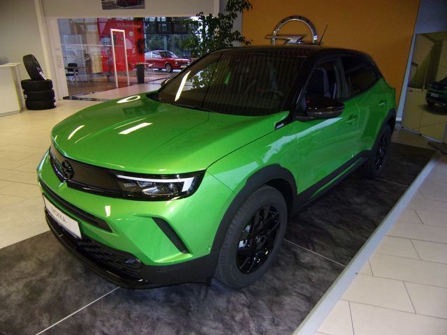 Grün (matcha grün metallic) Gebraucht 2022 Opel Mokka GS Line SUV | 21.450 € (Fairer Preis) - Bild 1/4