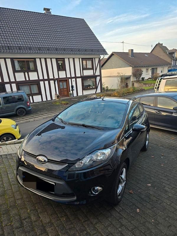Schwarz Gebraucht 2012 Ford Fiesta Trend Kleinwagen | 3.900 € (Fairer Preis) - Bild 1/4