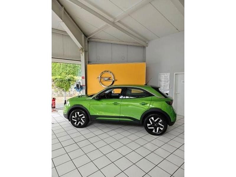 Gebraucht Opel Mokka-e Elegance 100 kW (136 PS) 2022 Mamba green met (metallic) SUV