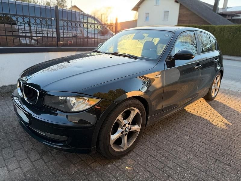 Second-hand BMW 116 122 CP (89 kW) 2010 Negru Hatchback
