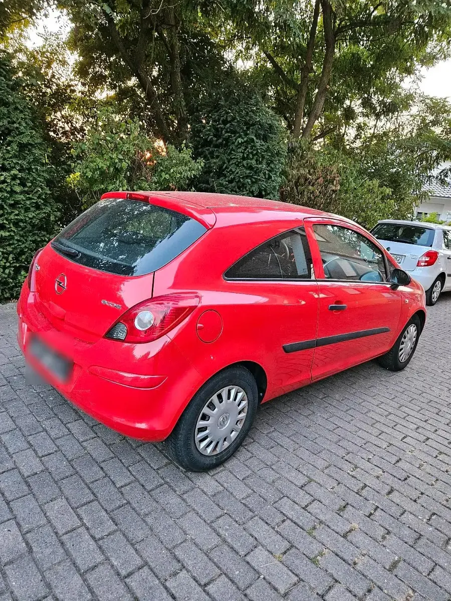 Gebraucht Opel Corsa 60 PS (44 kW) 2009 Rot Kleinwagen