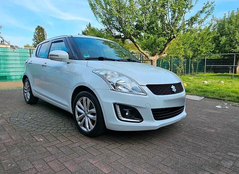 Weiß Gebraucht 2014 Suzuki Swift Kleinwagen | 6.499 € - Bild 1/4