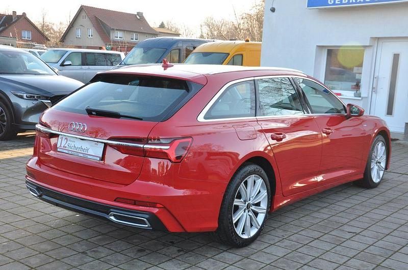 Gebraucht Audi A6 S-Line 265 PS (194 kW) 2022 Tangorot metallic Kombi