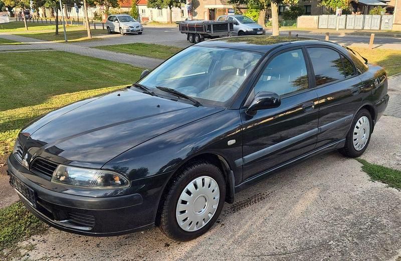 Schwarz Gebraucht 2003 Mitsubishi Carisma Limousine | 699 € (Fairer Preis) - Bild 1/4