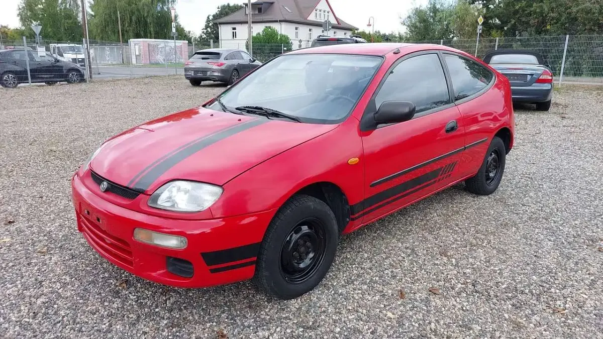 Gebraucht Mazda 323C 73 PS (53 kW) 1995 Rot Limousine