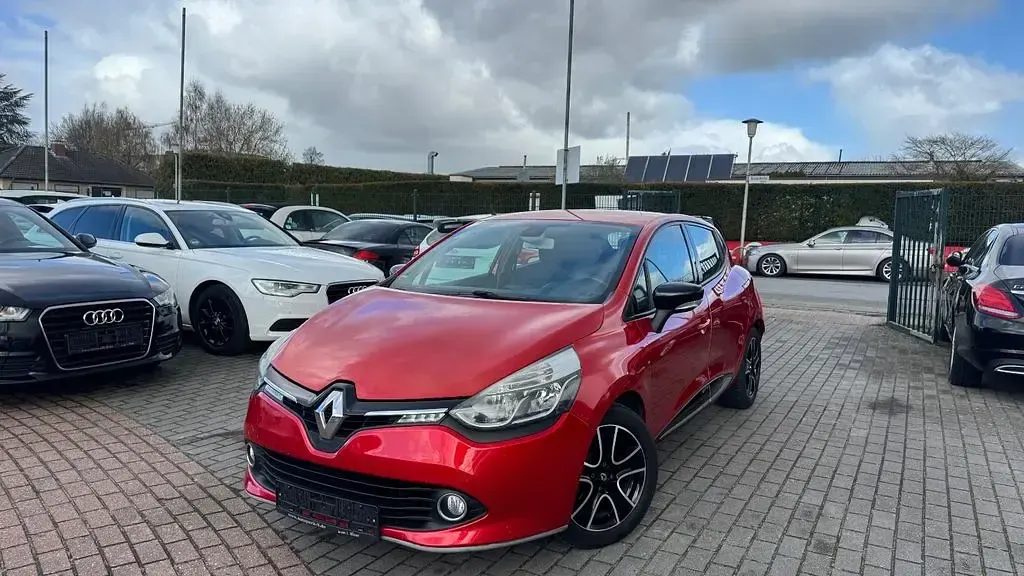 Używany Renault Clio IV Initiale Paris 90 KM (66 kW) 2014 Pomarańczowy Sedan/Limuzyna