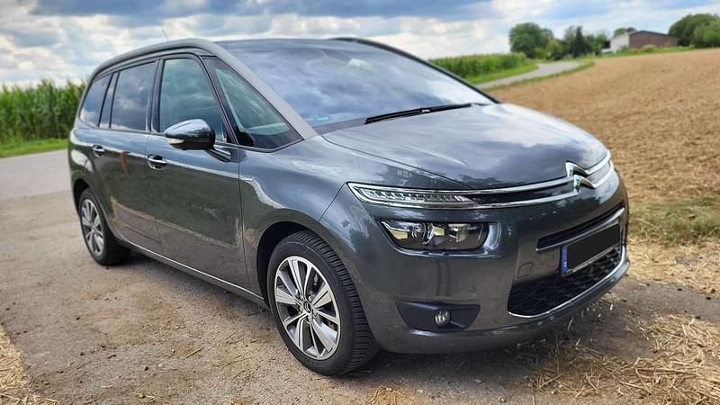 Grau Gebraucht 2014 Citroën Grand C4 Picasso Exclusive Van / Kleinbus | 9.900 € (Fairer Preis) - Bild 1/4