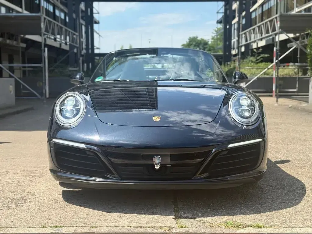 Gebraucht Porsche 911 Carrera Cabriolet 370 PS (272 kW) 2018 Tiefschwarz (metallic) Cabrio