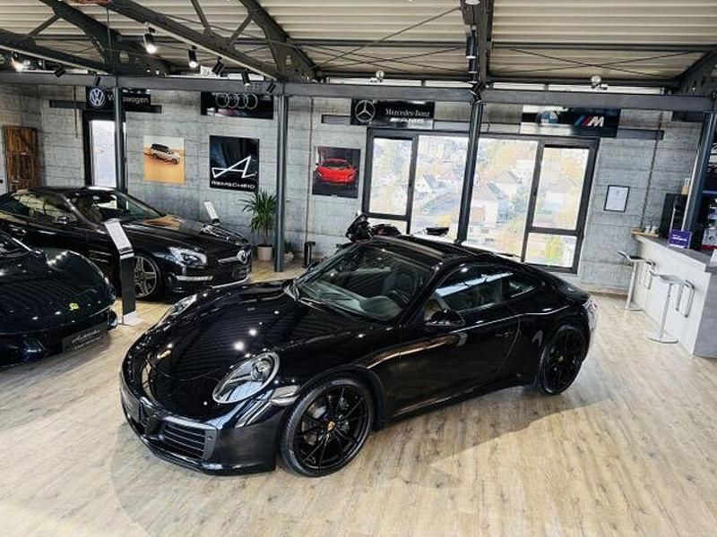 Gebraucht Porsche 911 Carrera 370 PS (272 kW) 2017 Tiefschwarzmetallic Coupé