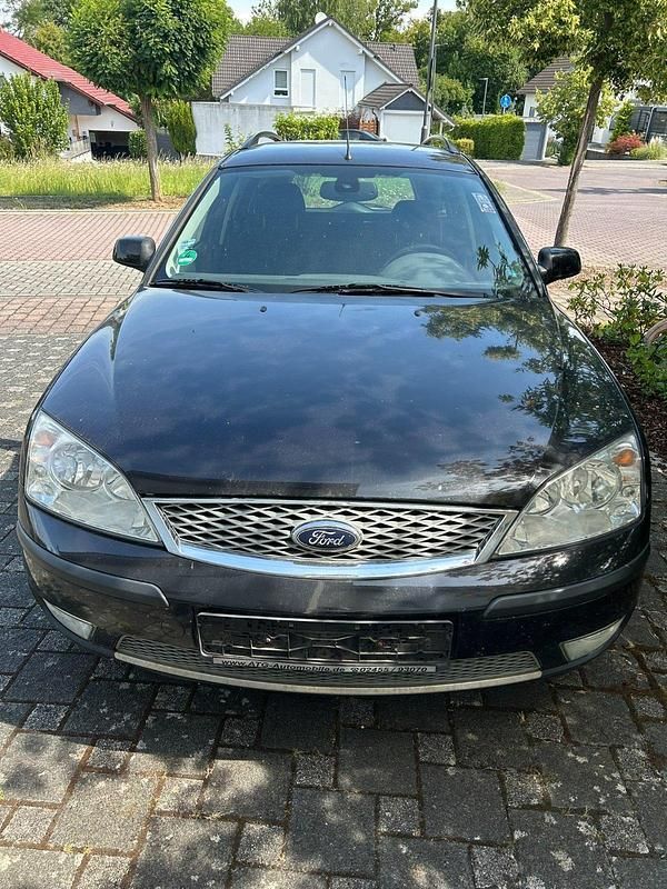 Schwarz Gebraucht 2006 Ford Mondeo Ghia Kombi | 1.000 € - Bild 1/4