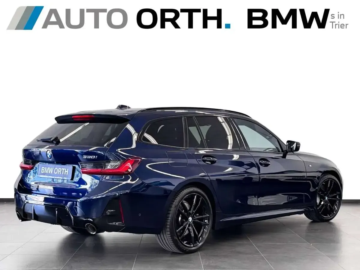 Gebraucht BMW 330 M Sport 245 PS (180 kW) 2023 Tansanitblau ii Kombi