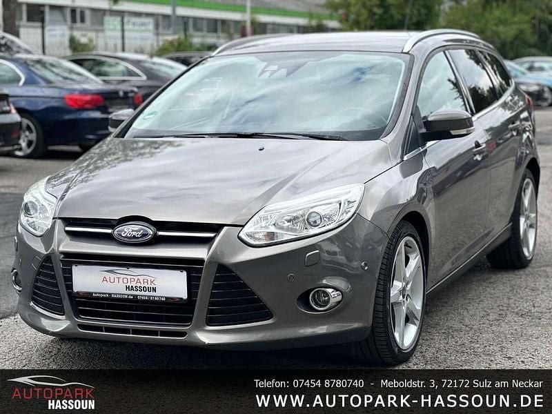 Brisbane braun (met.) Gebraucht 2012 Ford Focus Titanium Kombi | 3.999 € (Guter Preis) - Bild 1/4