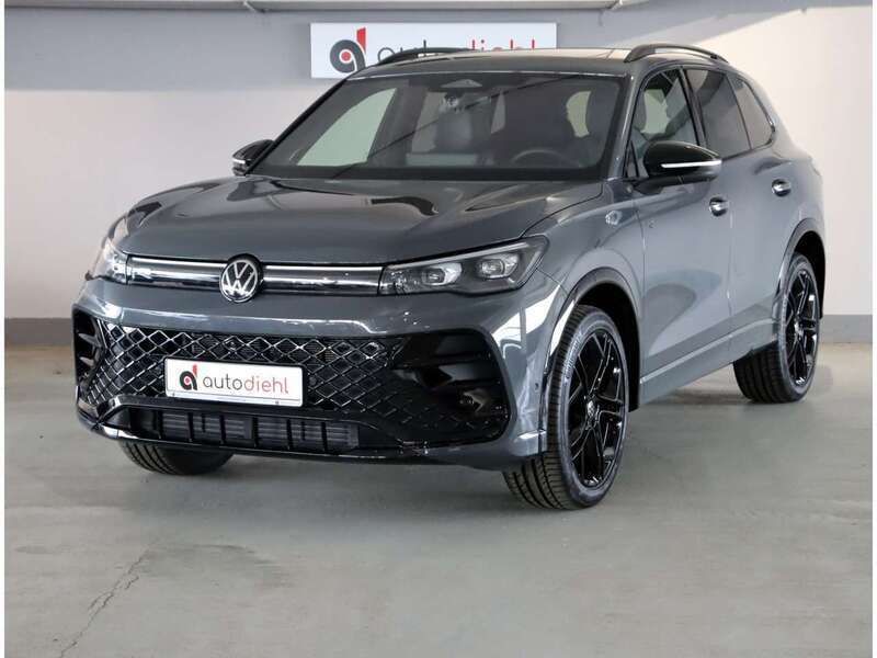 Grey metallic Gebraucht 2024 VW Tiguan R-line SUV | 51.490 € (Superpreis) - Bild 1/1