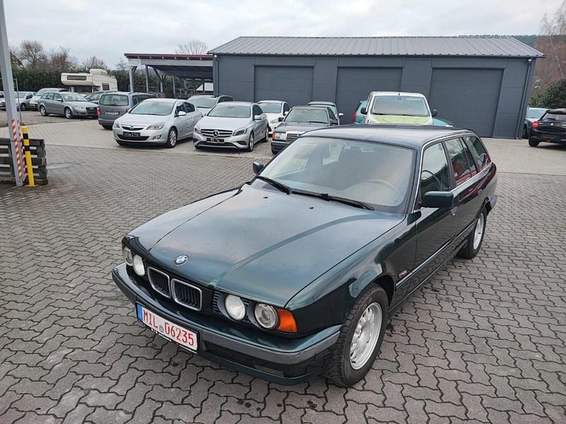 Grün Gebraucht 1994 BMW 518 Kombi | 1.950 € - Bild 1/4