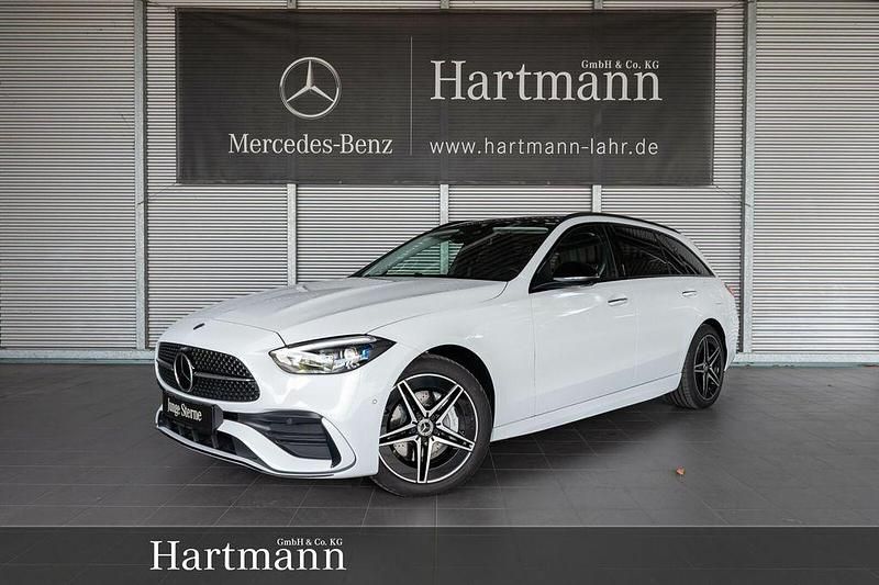 Opalithweiß bright Gebraucht 2024 Mercedes C300e AMG Line Premium Plus Kombi | 55.850 € (Teuer) - Bild 1/4