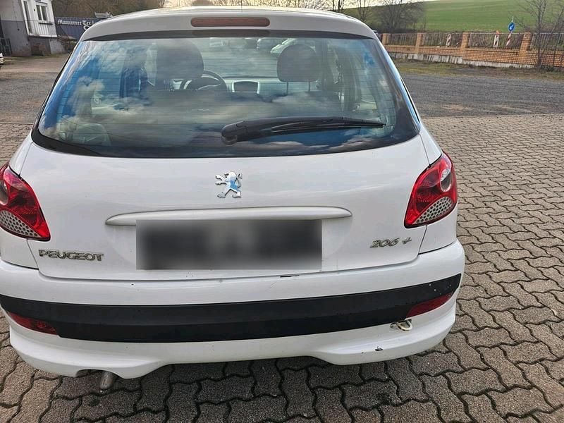 Gebraucht Peugeot 206+ 73 PS (53 kW) 2011 Weiß Kleinwagen