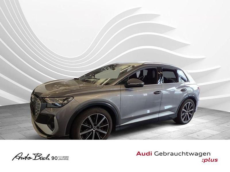 Grau (taifungrau metallic) Gebraucht 2022 Audi Q4 e-tron Ambiente SUV | 29.870 € - Bild 1/3