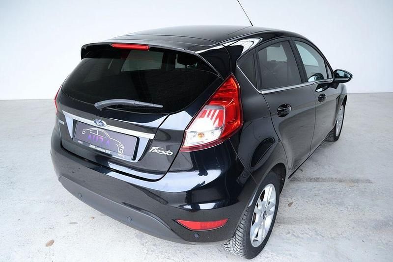 Gebraucht Ford Fiesta Titanium 125 PS (91 kW) 2017 Iridiumschwarz metallic Limousine