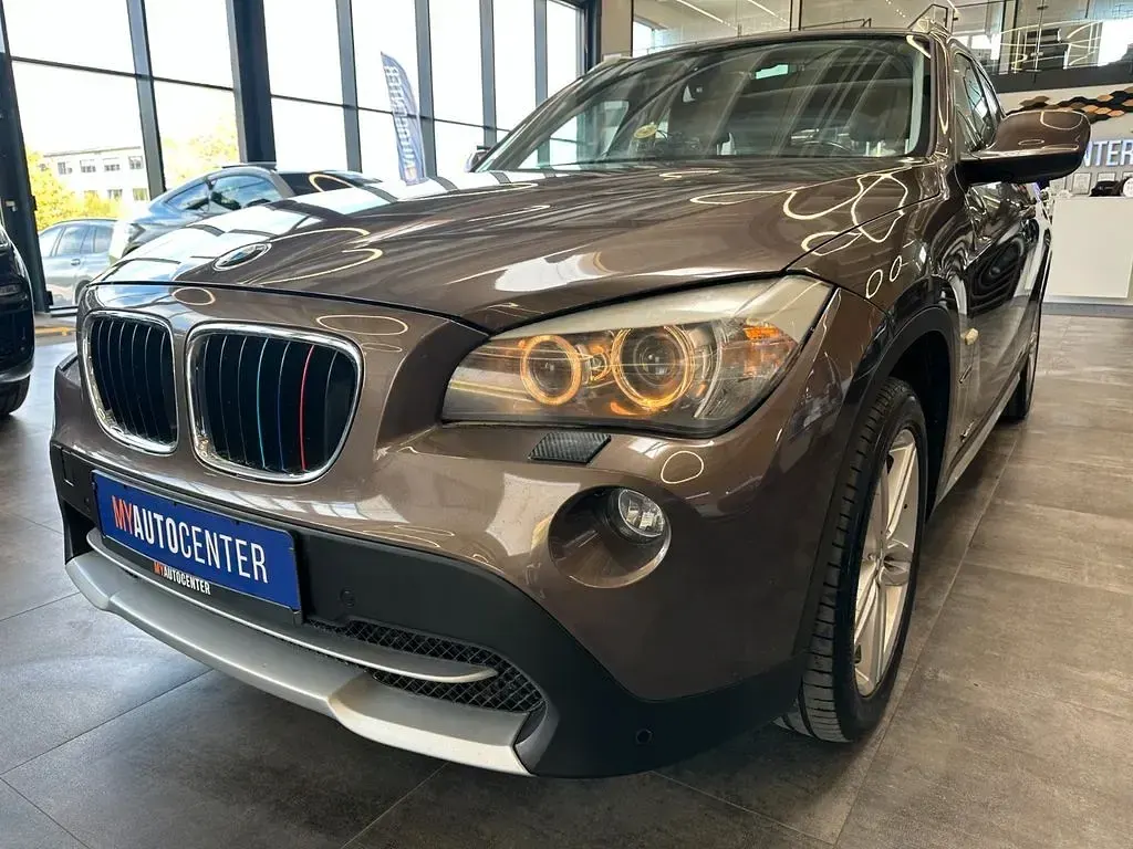 Second-hand BMW X1 143 CP (105 kW) 2012 Maro SUV