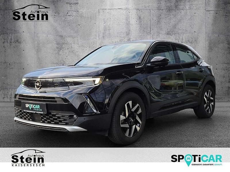 Gebraucht Opel Mokka-e 100 kW (136 PS) 2022 Diamant schwarz/karbon schwarz (metallic) SUV