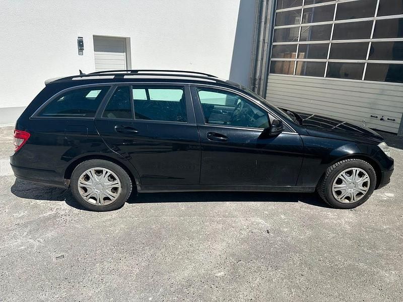 Second-hand Mercedes C220 Elegance 170 CP (125 kW) 2009 Negru Berlinǎ