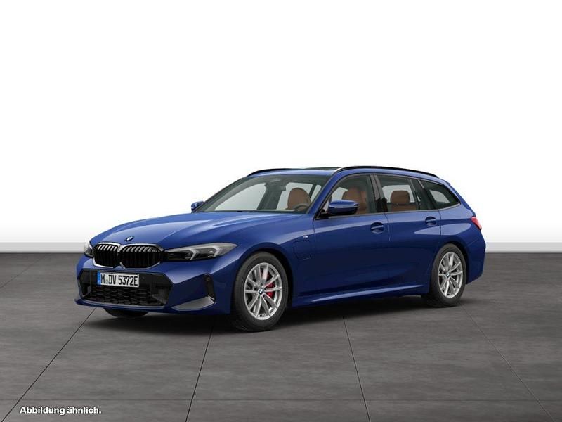 Blau Gebraucht 2024 BMW 330e Kombi | 53.546 € - Bild 1/4