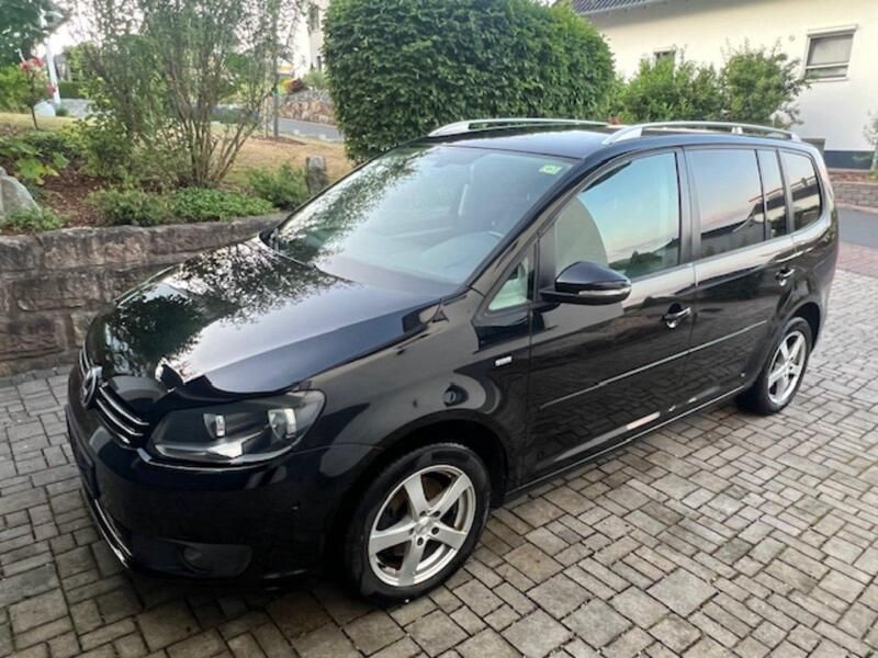 Schwarz Gebraucht 2013 VW Touran Life Van / Kleinbus | 8.399 € (Guter Preis) - Bild 1/4