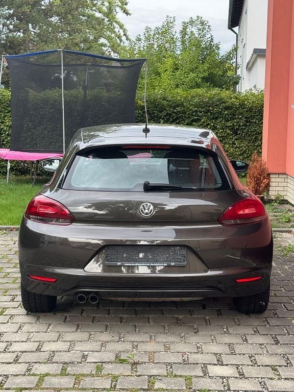 Braun Gebraucht 2011 VW Scirocco Coupé | 9.450 € (Fairer Preis) - Bild 1/4