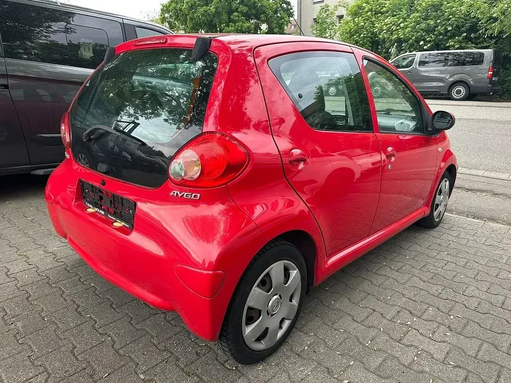 Gebraucht Toyota Aygo Cool 68 PS (50 kW) 2006 Rot Kleinwagen