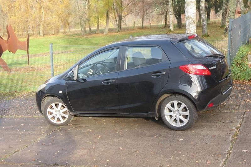 Gebraucht Mazda 2 Impuls 75 PS (55 kW) 2009 Schwarz Limousine