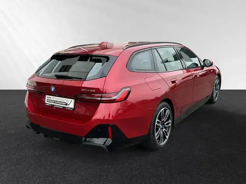 Gebraucht BMW i5 M Sport 289 kW (394 PS) 2025 Fire red metallic Kombi