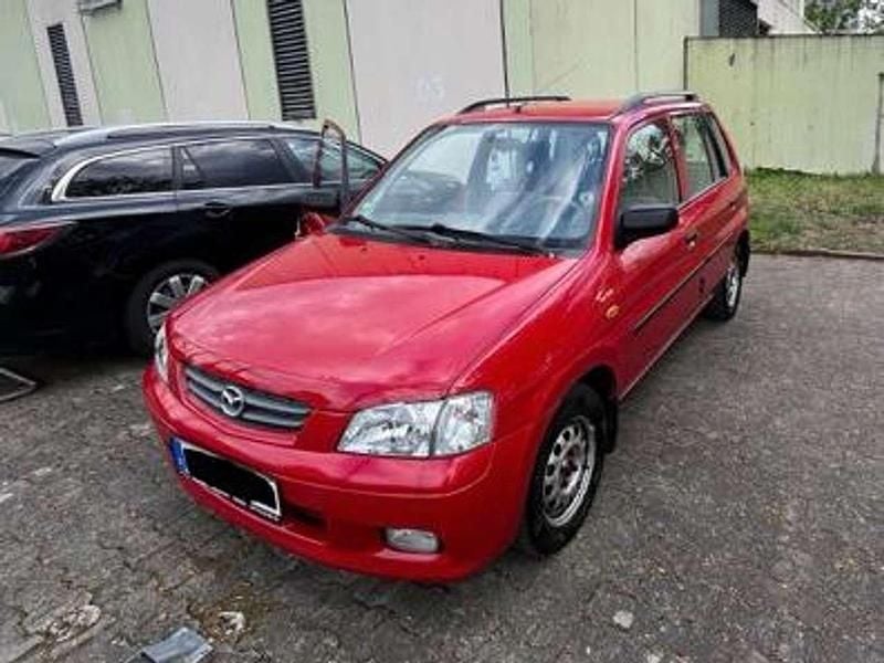 Second-hand Mazda Demio 63 CP (46 kW) 2002 Roșu Hatchback