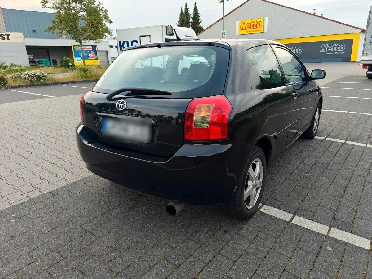 Gebraucht Toyota Corolla 97 PS (71 kW) 2003 Schwarz Limousine
