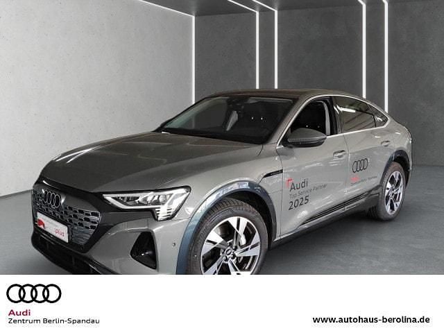 Chronosgrau metallic Gebraucht 2024 Audi Q8 Sportback e-tron Advanced SUV | 54.888 € (Superpreis) - Bild 1/4