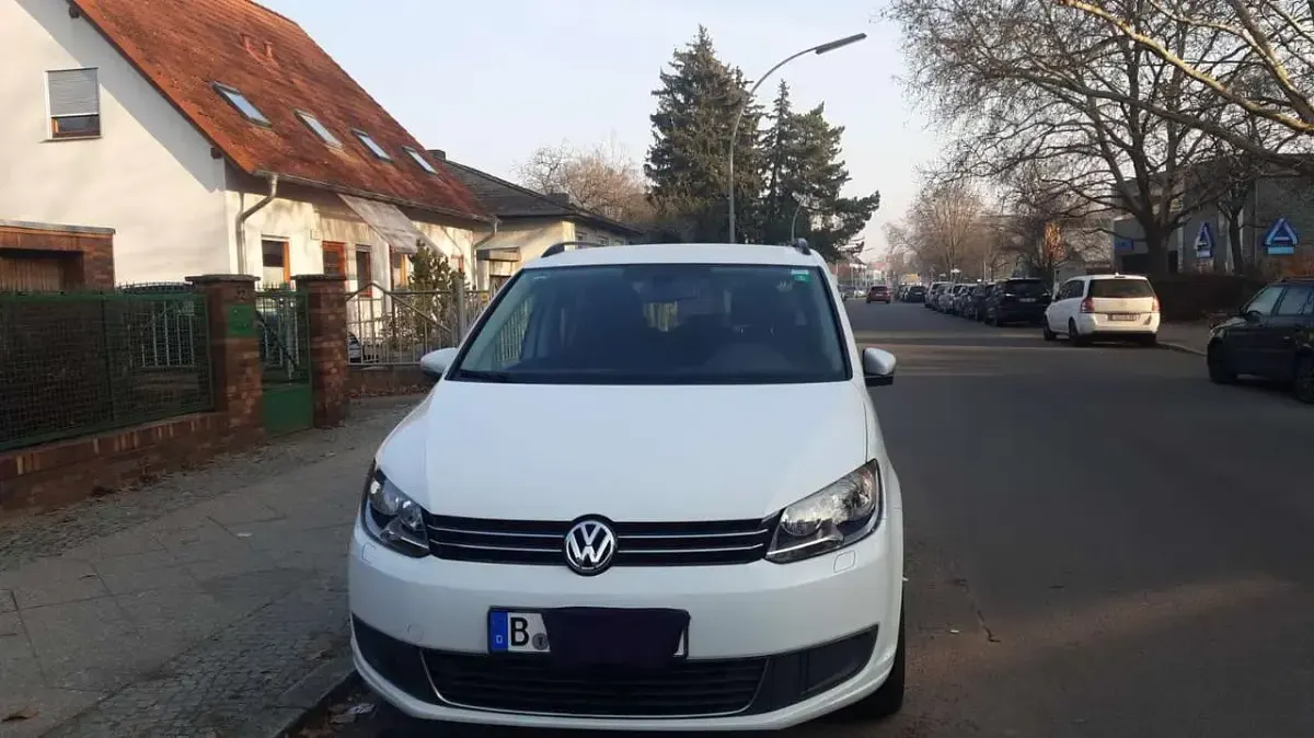 Gebraucht VW Touran Comfortline 150 PS (110 kW) 2014 Weiß Van / Kleinbus