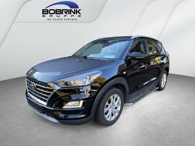 Phantom black / mic Gebraucht 2019 Hyundai Tucson Trend SUV | 17.990 € (Fairer Preis) - Bild 1/4