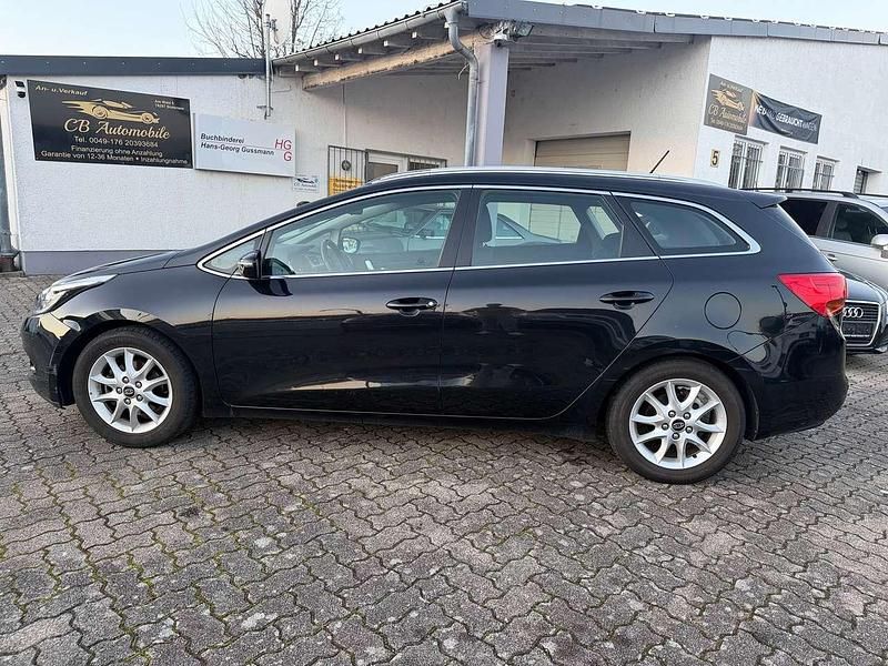 Gebraucht Kia Ceed Sportswagon Edition 7 135 PS (99 kW) 2014 (1k) black pearl Kombi