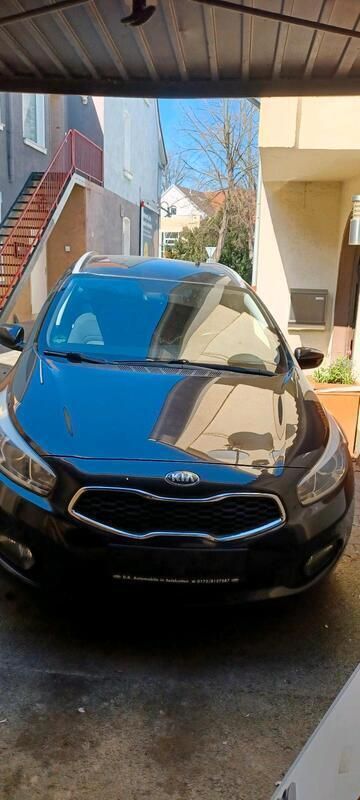 Schwarz Gebraucht 2013 Kia Ceed Sportswagon Spirit Kombi | 8.099 € (Etwas zu teuer) - Bild 1/4