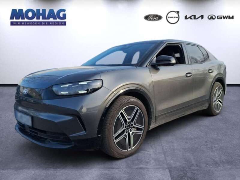 Grau Gebraucht 2024 Ford Capri Premium SUV | 53.990 € - Bild 1/4