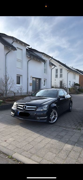 Schwarz Gebraucht 2012 Mercedes C250 AMG line Coupé | 12.500 € (Fairer Preis) - Bild 1/4