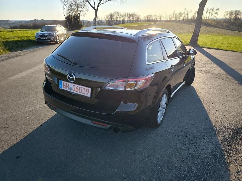 Second-hand Mazda 6 Inclusive 120 CP (88 kW) 2011 Negru Break