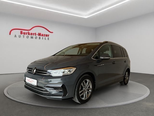 Delfingrau metallic Gebraucht 2021 VW Touran Highline Van / Kleinbus | 31.985 € (Etwas zu teuer) - Bild 1/4