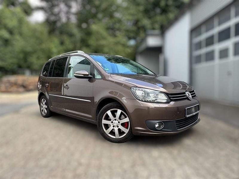 Braun Gebraucht 2012 VW Touran Highline Van / Kleinbus | 6.490 € (Guter Preis) - Bild 1/4