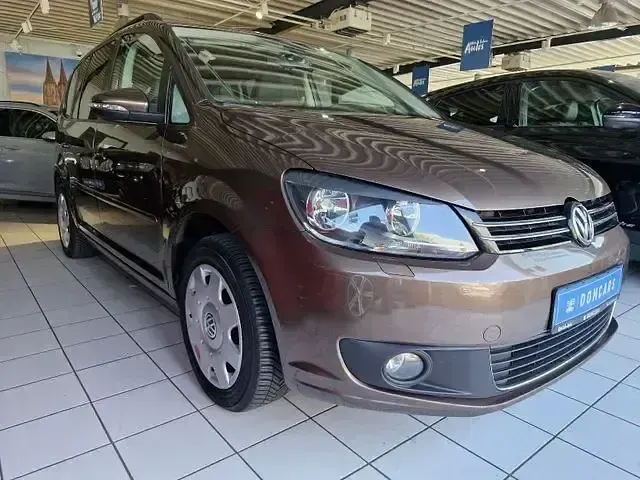 Gebraucht VW Touran Comfortline 105 PS (77 kW) 2011 Braun Van / Kleinbus