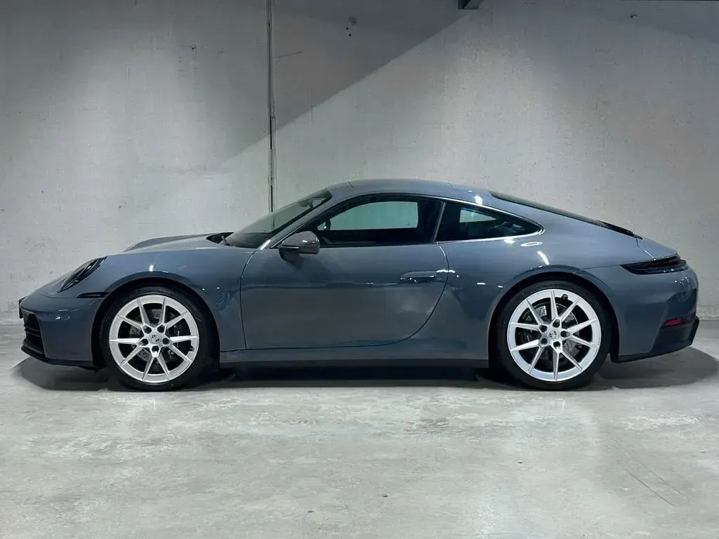 Gebraucht Porsche 911 Carrera 394 PS (289 kW) 2025 Schiefergrau neo Coupé