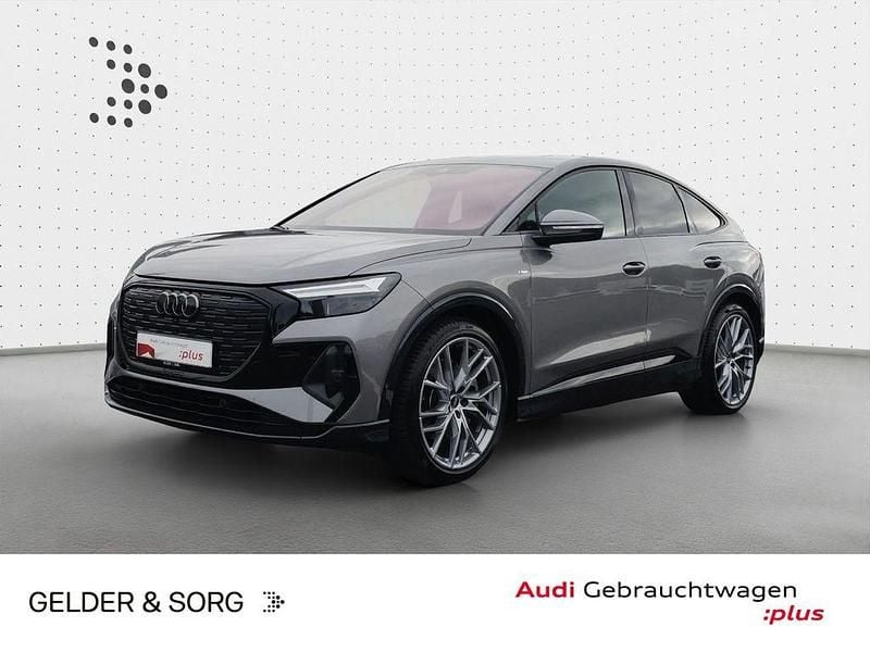 Taifungrau metallic Gebraucht 2022 Audi Q4 Sportback e-tron Ambiente SUV | 33.880 € (Fairer Preis) - Bild 1/4